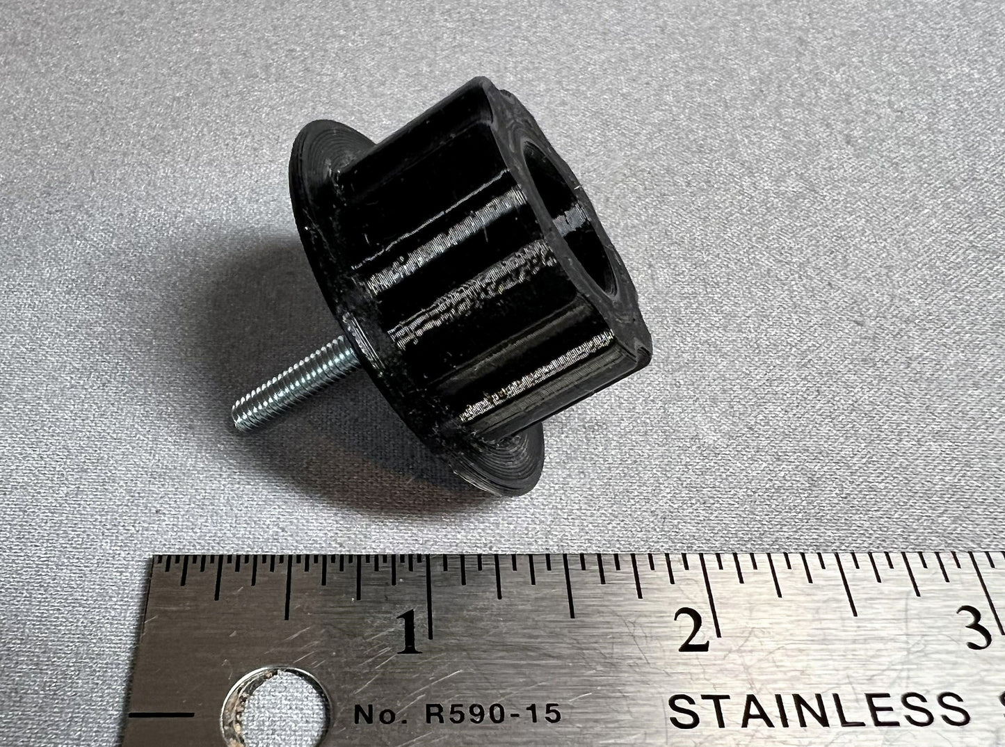 larger knob by ruler - side view